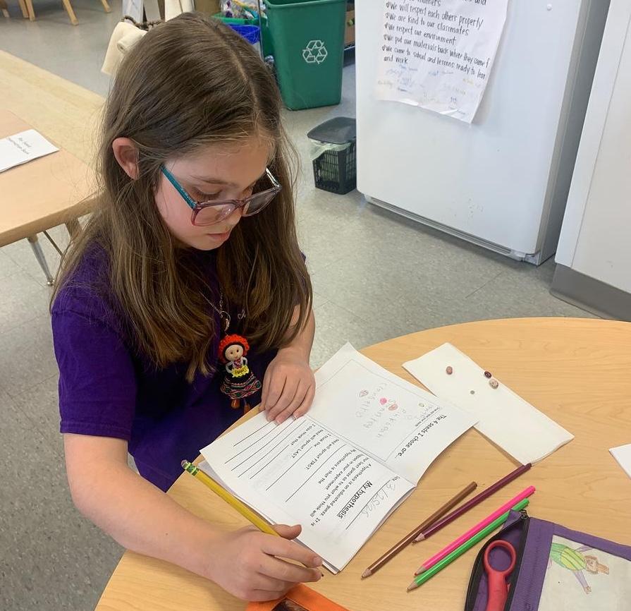 Elementary students in a Montessori classroom