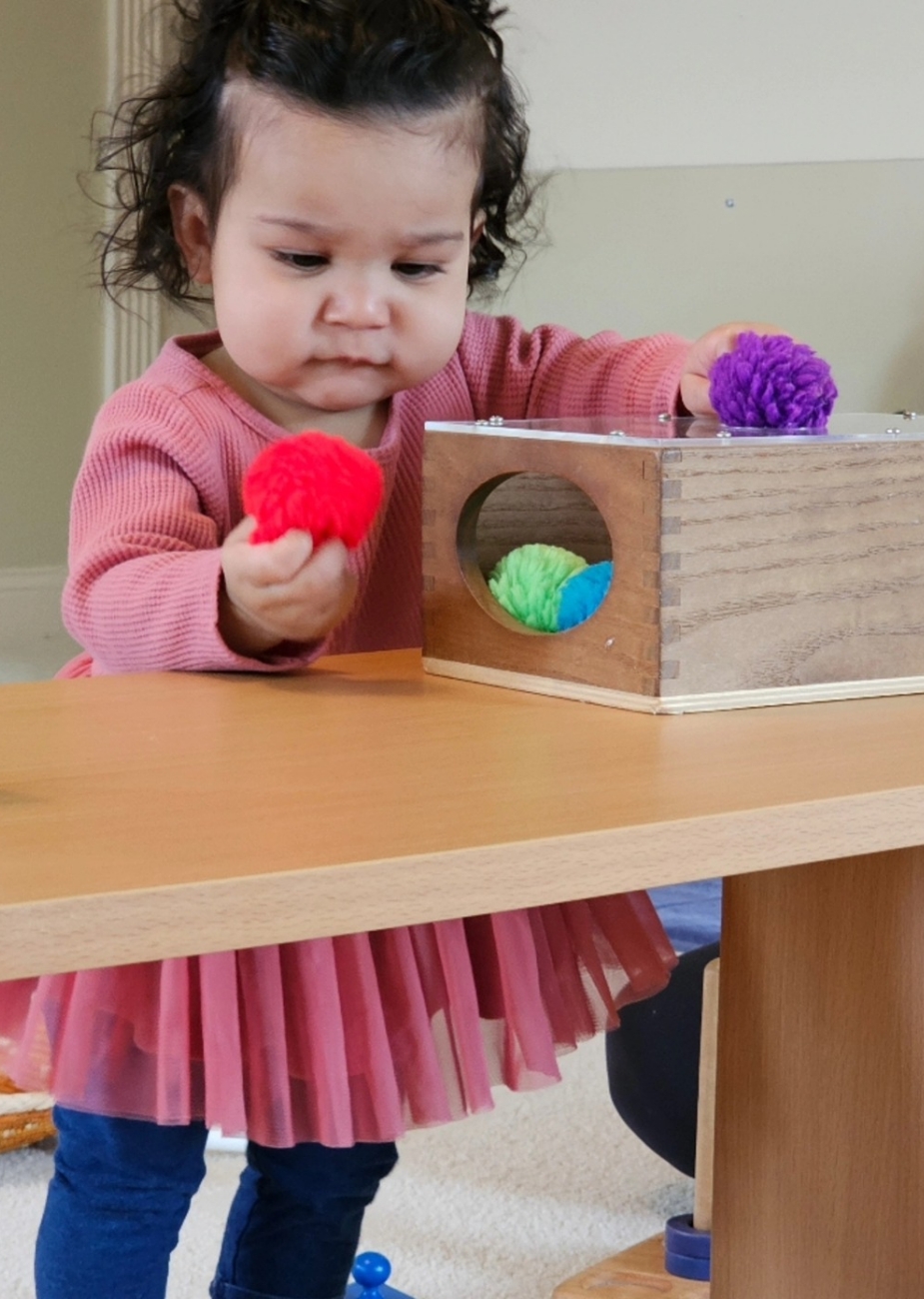 Baby with Montessori materials