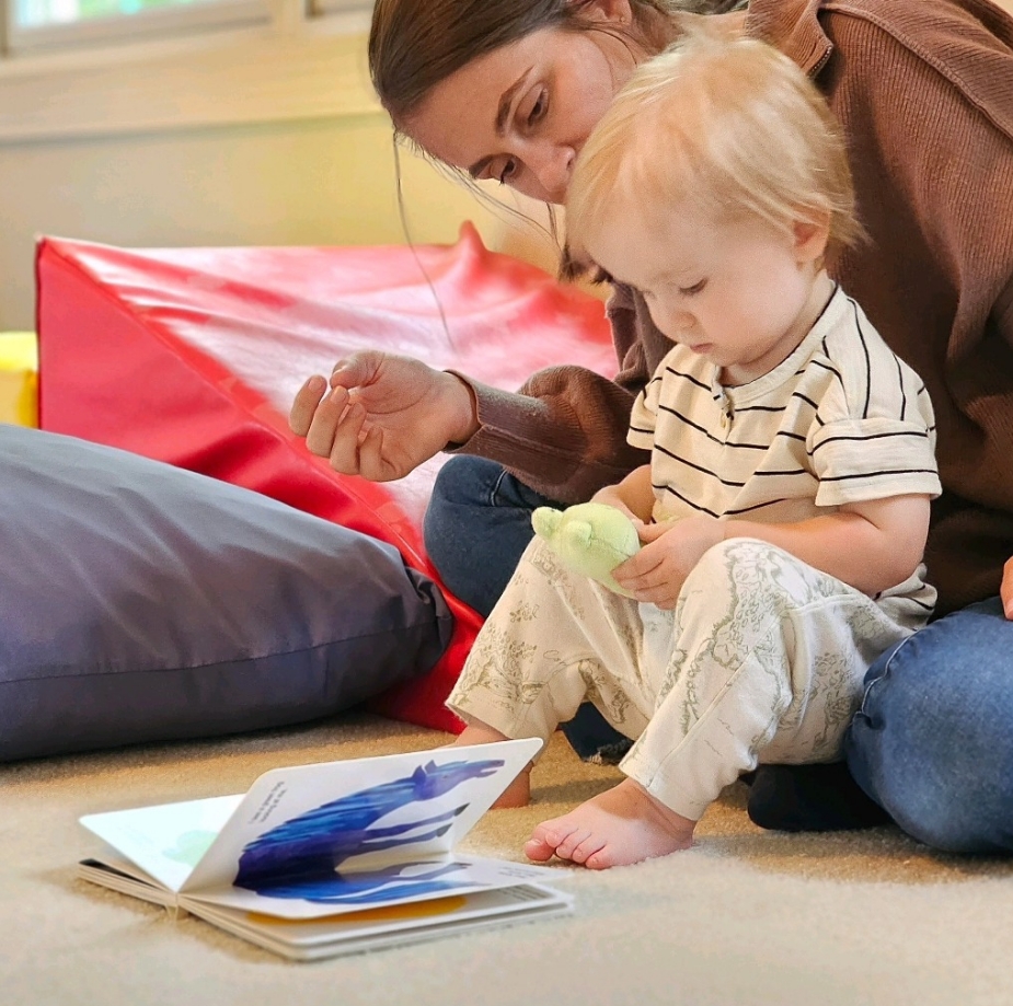 Infant and caregiver at Montessori Mornings